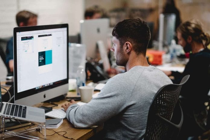 man working at computer