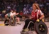 A wheelchair user playing sport