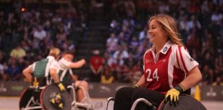 A wheelchair user playing sport