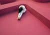 Person curled up on the floor in despair