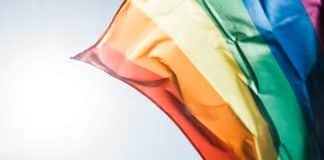 A rainbow flag, symbolising LGBT pride