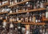Shelves full of bottles in alcohol shop
