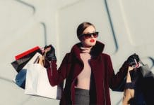 Woman holding lots of shopping bags