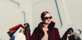 Woman holding lots of shopping bags