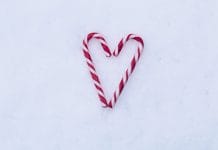 Candy canes in the shape of a love heart