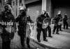 Police holding up shields