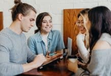 A group of students socialising over coffee