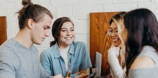 A group of students socialising over coffee