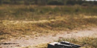 A pistol, laying on the grass