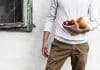 A man holds vegetables