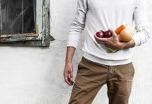 A man holds vegetables