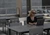 A woman uses a computer