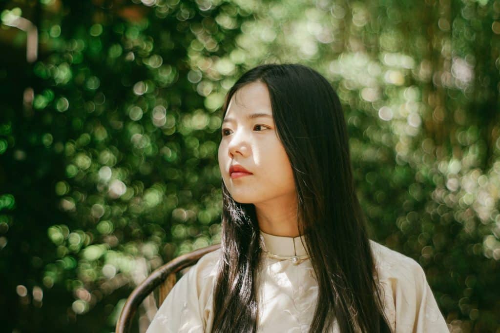 A Chinese woman looking unhappy