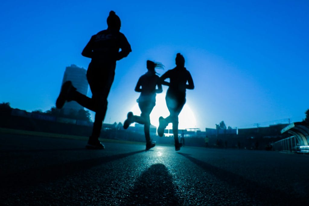 Women run in the dark