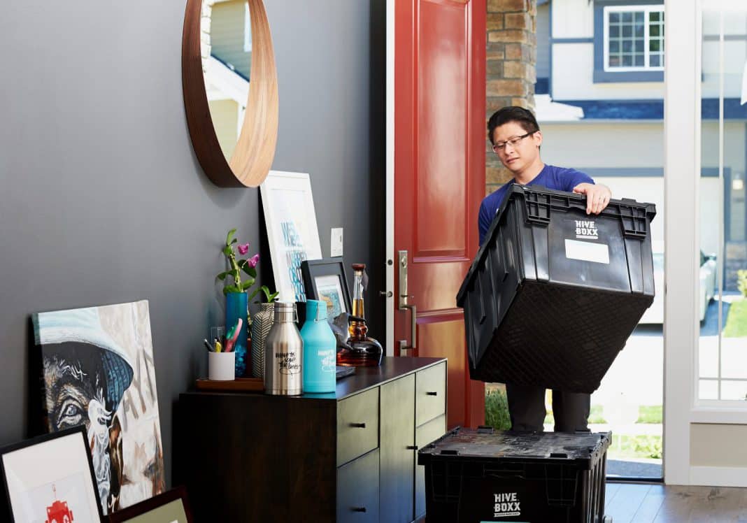A man moving out of his apartment