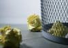 Yellow crumpled paper in a waste bin.