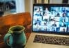 macbook pro displaying group of people