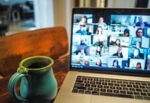 macbook pro displaying group of people