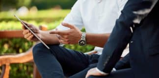 two people sitting during day