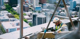 man doing welding on outdoors