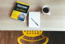 white ceramic mug on white paper