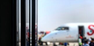 people standing beside airplane during daytime