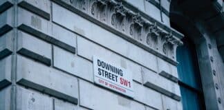a street sign on the side of a building
