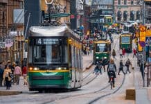 green and yellow city tram