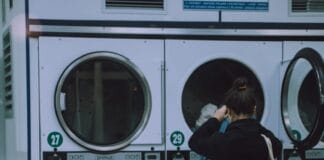 woman washing her clothes photograph